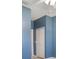 Bright bedroom features blue walls and ceiling fan at 3436 Gerber Daisy Ln, Oviedo, FL 32766
