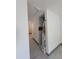 Bathroom with gray tile accents and shower with curtain at 3463 Fekany Pl, Orlando, FL 32805