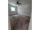 Bedroom featuring cozy carpet flooring, a window, and ceiling fan at 3463 Fekany Pl, Orlando, FL 32805