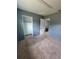Neutral bedroom featuring a spacious closet and comfortable carpet flooring at 3463 Fekany Pl, Orlando, FL 32805