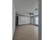 Living room with tile floors, baseboard trim, neutral walls and natural lighting at 3463 Fekany Pl, Orlando, FL 32805