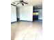 Bright and airy living room with tile flooring and modern ceiling fan at 3463 Fekany Pl, Orlando, FL 32805