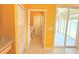 Hallway leading to washer and dryer, access to patio at 402 Ravenshill Way, Deland, FL 32724