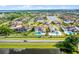 An aerial view reveals a neighborhood with luxurious homes, pools, and well-kept landscaping at 4065 Isabella Cir, Windermere, FL 34786
