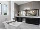 Bright bathroom featuring a soaking tub, modern fixtures, and a large mirror for a spa-like experience at 4065 Isabella Cir, Windermere, FL 34786