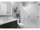 Modern bathroom features a glass shower, decorative accents, and sleek vanity at 4065 Isabella Cir, Windermere, FL 34786