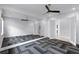 Mirror-lined bonus room with geometric flooring, ceiling fan, and lots of potential for fitness and fun at 4065 Isabella Cir, Windermere, FL 34786