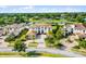 Stunning Mediterranean home boasts a lush landscape, tile roof, and circular driveway at 4065 Isabella Cir, Windermere, FL 34786