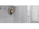 Charming hallway with coat hooks and sunhat, leading to a naturally lit room at 4065 Isabella Cir, Windermere, FL 34786