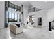 Bright and airy living room with soaring ceilings, large windows, and elegant decor, creating a welcoming atmosphere at 4065 Isabella Cir, Windermere, FL 34786