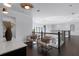 Open loft area with dark floors and railing, offering comfortable seating at 4065 Isabella Cir, Windermere, FL 34786