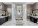 Stunning main bathroom with dual vanities, soaking tub, and separate shower areas at 4065 Isabella Cir, Windermere, FL 34786