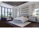 Beautiful main bedroom with large windows, seating area, and decorative ceiling at 4065 Isabella Cir, Windermere, FL 34786