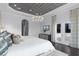 Bright main bedroom featuring stylish ceiling, patio access, and modern decor at 4065 Isabella Cir, Windermere, FL 34786