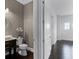 The powder room featuring decorative wallpaper, stylish mirror, and modern fixtures at 4065 Isabella Cir, Windermere, FL 34786