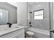 Bright bathroom featuring modern vanity, tiled shower, and updated fixtures at 4364 Sw 172Nd Street Rd, Ocala, FL 34473