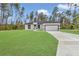 Attractive single-story home with a well-manicured lawn and an attached two-car garage at 4364 Sw 172Nd Street Rd, Ocala, FL 34473