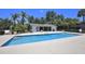 Community swimming pool features crystal clear water and a spacious sunbathing deck at 4727 S Texas Ave # 4727C, Orlando, FL 32839