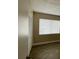 Bedroom with wood-look floors, white walls, window, and closet at 4749 S Texas Ave # 4749B, Orlando, FL 32839