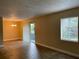 An open living room featuring lots of light, dining area, and sliding glass doors at 4749 S Texas Ave # 4749B, Orlando, FL 32839