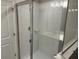 Modern bathroom features a glass shower enclosure with white subway tile surround at 5113 Prairie Preserve Run, St Cloud, FL 34772