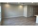 Living room with light wood floors, recessed lighting, and neutral-toned walls at 5113 Prairie Preserve Run, St Cloud, FL 34772