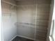 Walk-in closet designed with adjustable wire shelving to maximize storage and organization of personal belongings at 5113 Prairie Preserve Run, St Cloud, FL 34772
