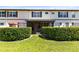 Backyard view with a green lawn and view of enclosed patio at 600 Northern Way # 1807, Winter Springs, FL 32708