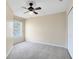 Bedroom featuring carpet, a window, white trim, and a ceiling fan at 600 Northern Way # 1807, Winter Springs, FL 32708