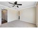 Bright bedroom with a ceiling fan, neutral carpet, and white trim at 600 Northern Way # 1807, Winter Springs, FL 32708