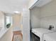 Functional laundry area with modern washer, dryer, and storage shelves at 600 Northern Way # 1807, Winter Springs, FL 32708