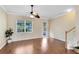 Inviting living room with hardwood floors and a ceiling fan at 600 Northern Way # 1807, Winter Springs, FL 32708