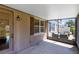 Enclosed patio with outdoor furniture and views of the building exterior at 600 Northern Way # 1807, Winter Springs, FL 32708