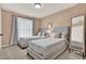 Serene bedroom with two twin beds, soft colors, and a window at 80 White Marsh Cir, Orlando, FL 32824