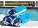 Stack of blue and white rolled towels sits on the edge of a sparkling swimming pool at 80 White Marsh Cir, Orlando, FL 32824