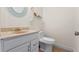 Cozy bathroom with decorative vanity and a modern, efficient toilet for everyday convenience at 820 Hobson St, Longwood, FL 32750