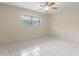 Empty bedroom with natural light and tile flooring at 820 Hobson St, Longwood, FL 32750