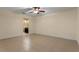Empty bedroom with tile floors and a ceiling fan at 820 Hobson St, Longwood, FL 32750