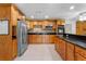 Modern kitchen featuring stainless steel appliances and granite countertops at 820 Hobson St, Longwood, FL 32750