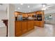 Open kitchen layout with a breakfast bar and modern appliances at 820 Hobson St, Longwood, FL 32750