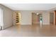 Open living room with tile floors and easy access to the bathroom and kitchen areas at 820 Hobson St, Longwood, FL 32750