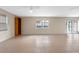 Spacious living room featuring tile flooring, ceiling fan, and outdoor access at 820 Hobson St, Longwood, FL 32750