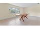 Bright living room featuring tile floors and a large window with natural light at 820 Hobson St, Longwood, FL 32750