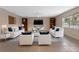 Modern living room with stylish furnishings, tile flooring, and lots of natural light at 820 Hobson St, Longwood, FL 32750