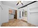 Bright room showcases laundry appliances, built-in shelving, and tiled floors at 1010 Timor Ave, Orlando, FL 32804