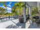 Screened lanai with a pool and outdoor seating, providing a blend of indoor and outdoor living with beautiful views at 10142 Hidden Dunes Ln, Orlando, FL 32832