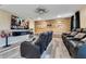 Home theater with cinema seating, large screen, and candy vending machine at 10142 Hidden Dunes Ln, Orlando, FL 32832