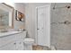 Bathroom featuring a shower, tile flooring, modern toilet, and vanity with stylish decor at 105 Spring Cove Trl, Altamonte Springs, FL 32714
