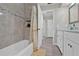 Full bathroom featuring a bathtub with tiled walls, shower curtain, and modern vanity at 105 Spring Cove Trl, Altamonte Springs, FL 32714