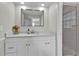 Bathroom with a glass-enclosed shower, large mirror, and white vanity with marble countertop at 105 Spring Cove Trl, Altamonte Springs, FL 32714